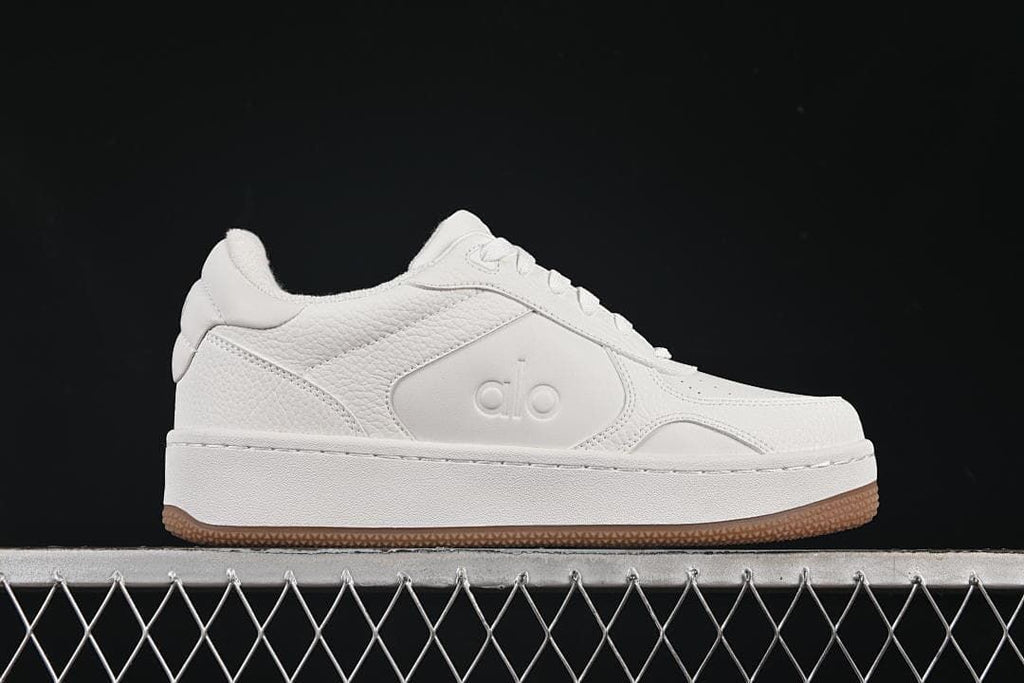 Side profile highlighting the low-top silhouette and raised sole