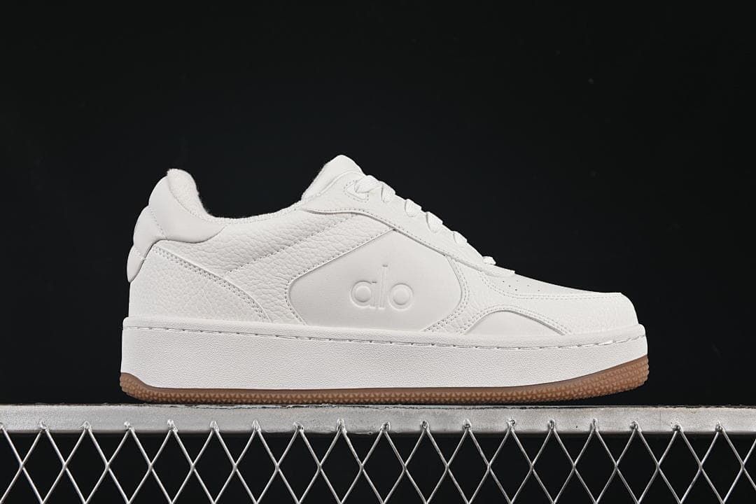 Side profile highlighting the low-top silhouette and raised sole