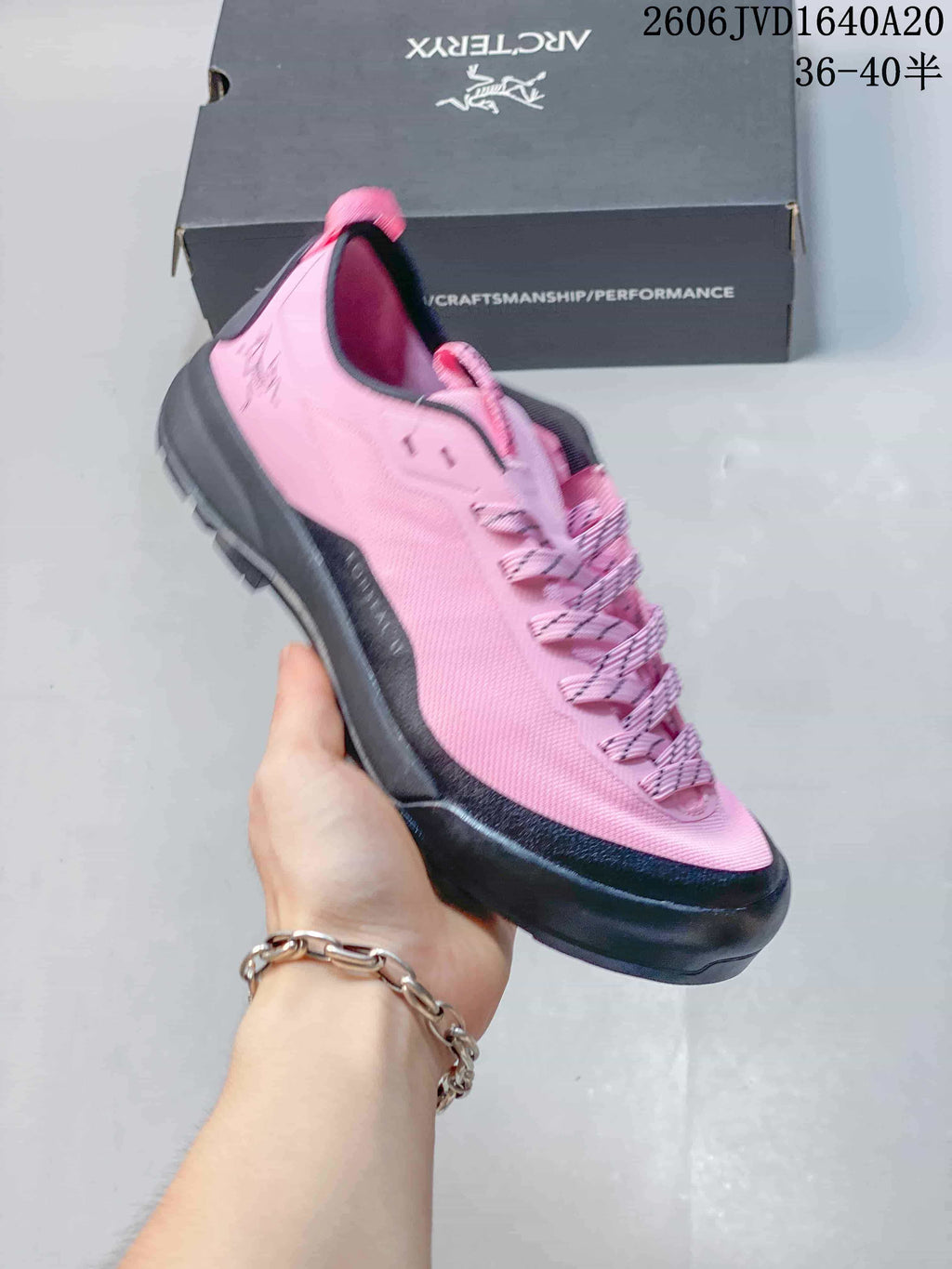 Pink Arc'teryx Konseal LT trail shoe with a dark outsole.