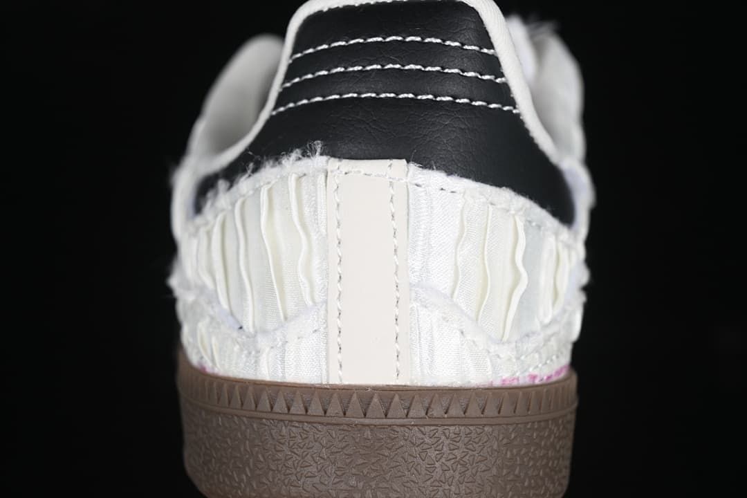 Rear view showing the black heel detail and dark brown sole