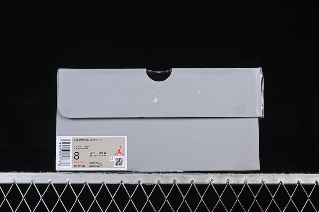Shoebox label identifying Air Jordan 14 Retro in black, black, and white