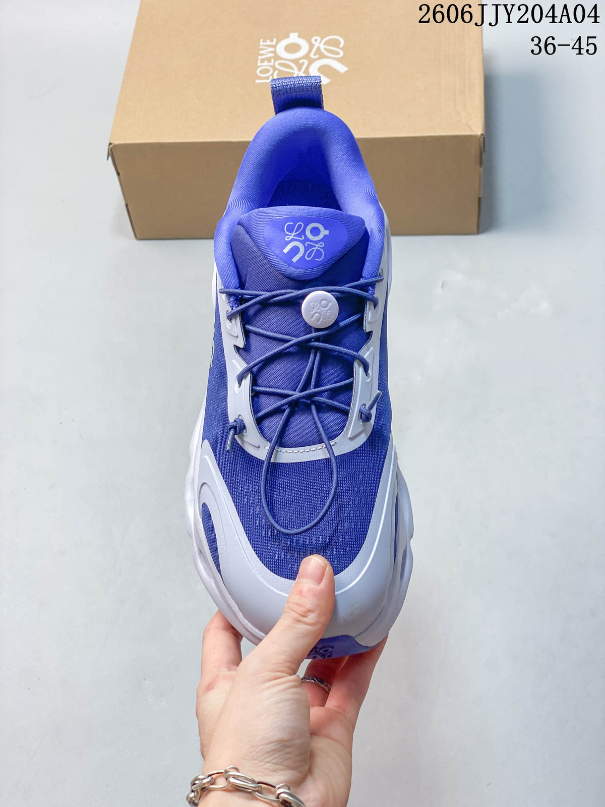 Top view showing the tongue, toggle detail and elastic-style laces.