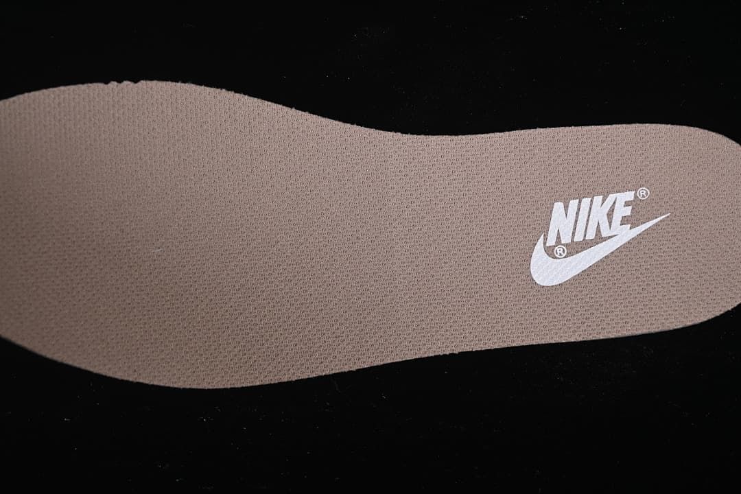 Close-up of the textured insole with Nike branding.