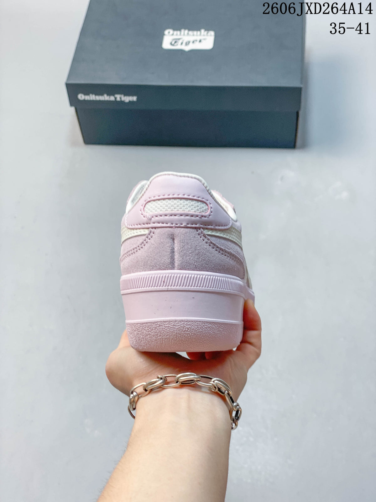 Rear view showing the pink heel and chunky sole