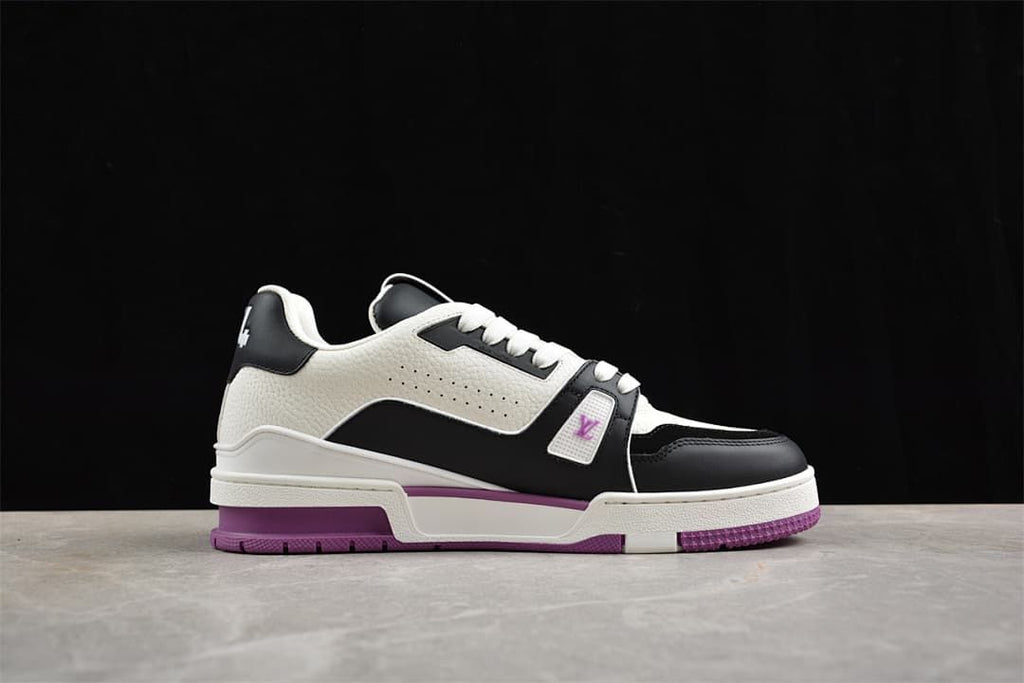 Side profile of the sneaker with white, black, and purple color blocking