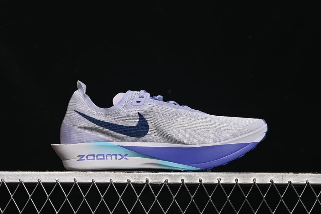 Side profile highlighting the ZoomX midsole branding and blue swoosh.
