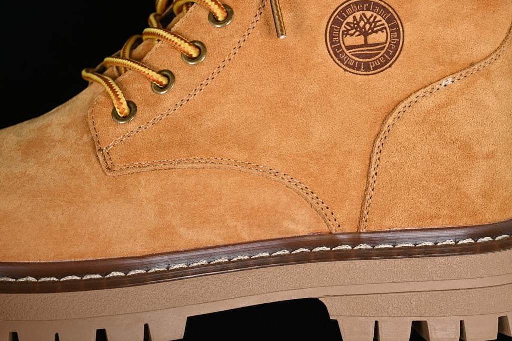 Detail of the side logo, stitching, laces, and sole edge