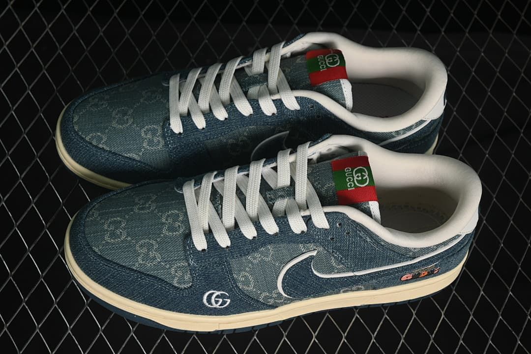 Pair of blue patterned low-top sneakers with white laces, viewed from above