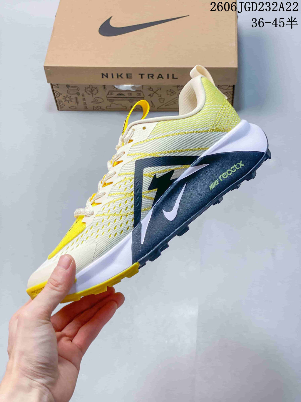 Side view of the shoe with ReactX midsole branding and trail outsole