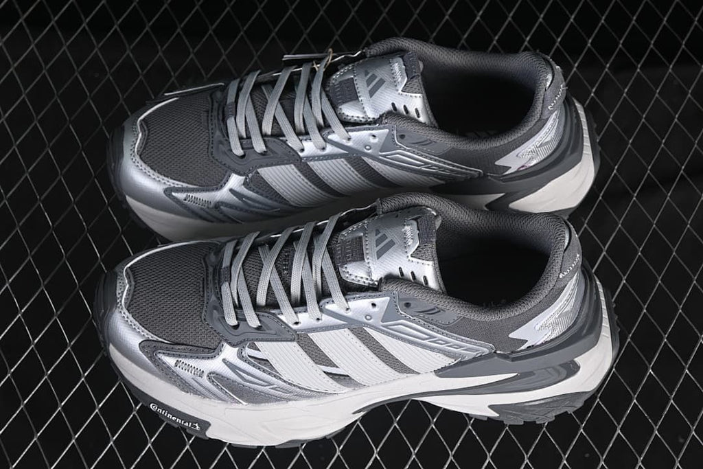 Pair of silver and gray XLG Storm Edge sneakers viewed from above.