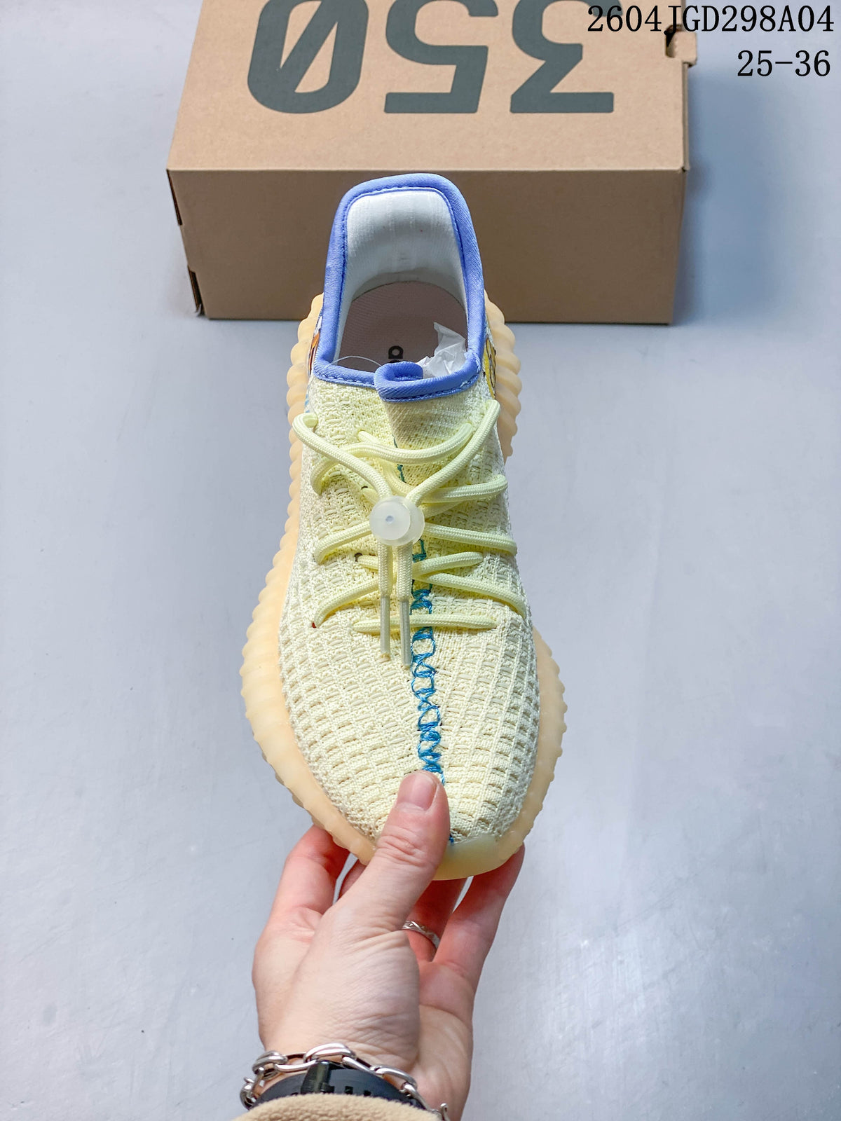 Top view of a cream Adidas Yeezy 350 V2 sneaker showing its laces and blue center stitching