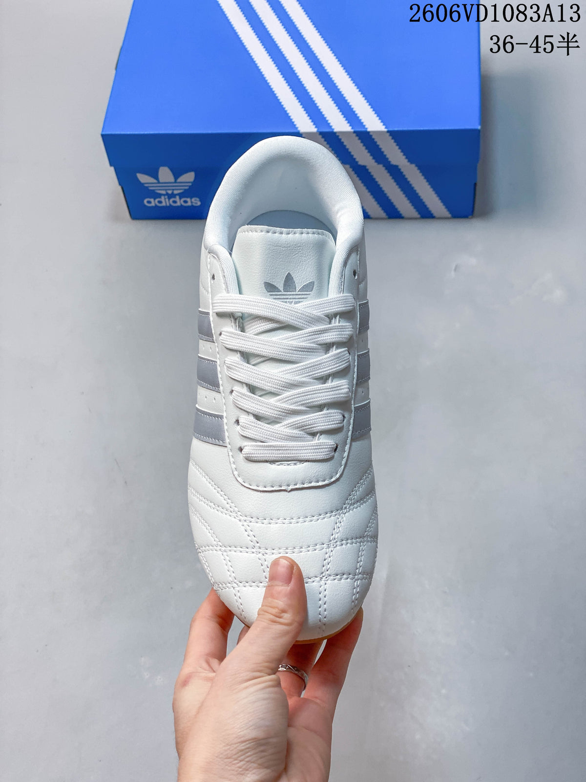 Top view showing the laces, tongue branding, and stitched toe panels.