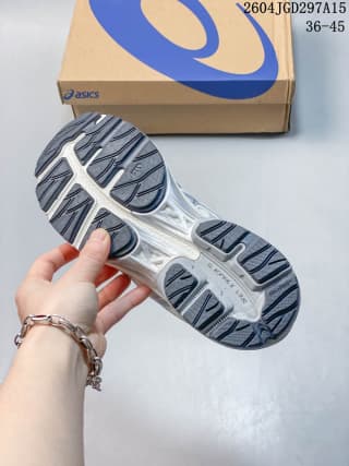 Underside view showing the segmented gray-and-white outsole tread.