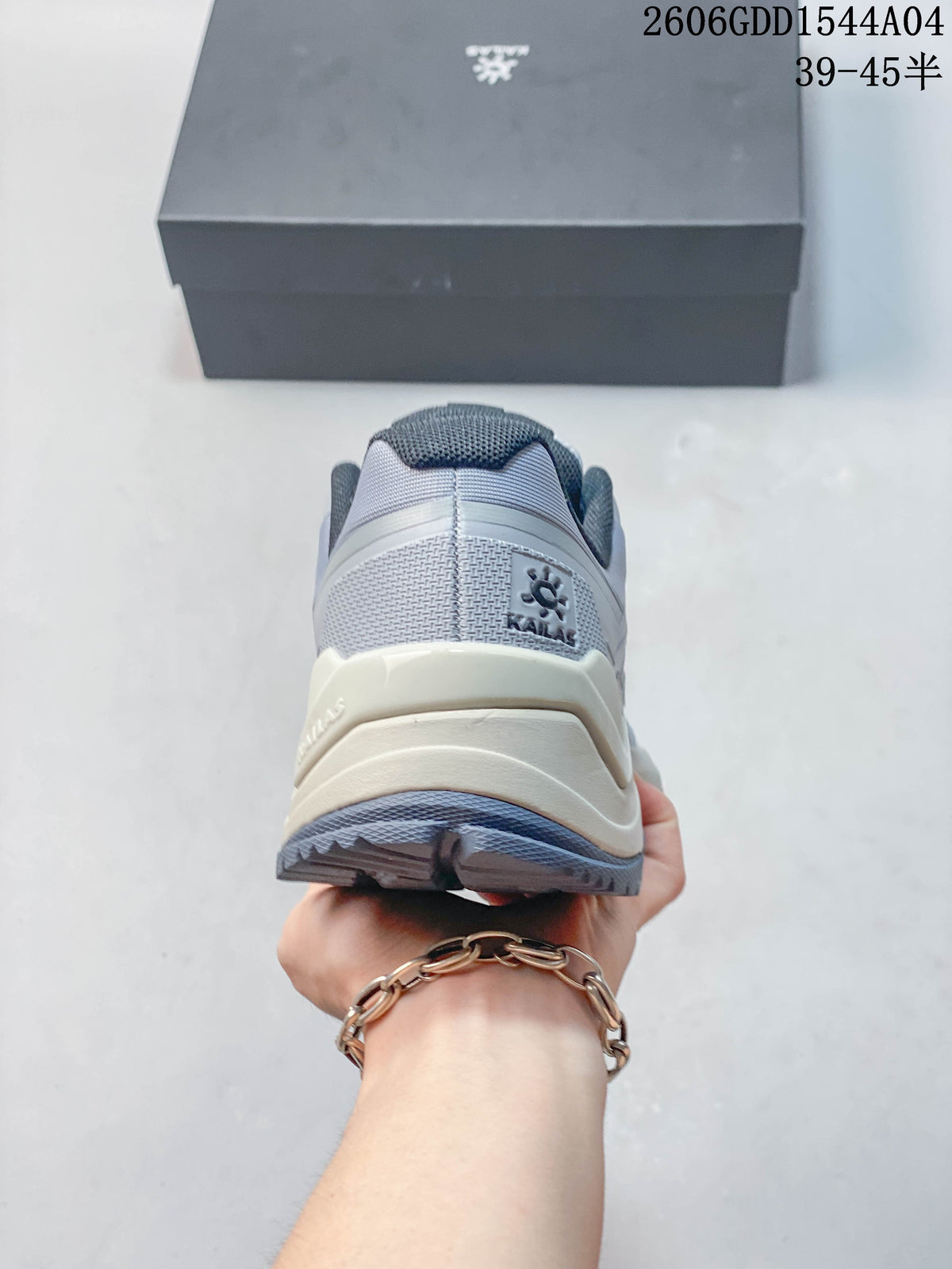 Rear view of a light grey KAILAS hiking shoe.