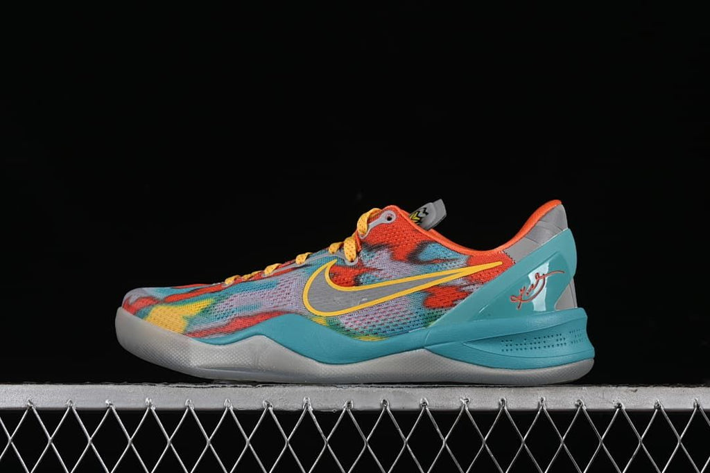 Side view of multicolor Nike Kobe VIII Protro basketball shoe with turquoise, orange, yellow, and gray details