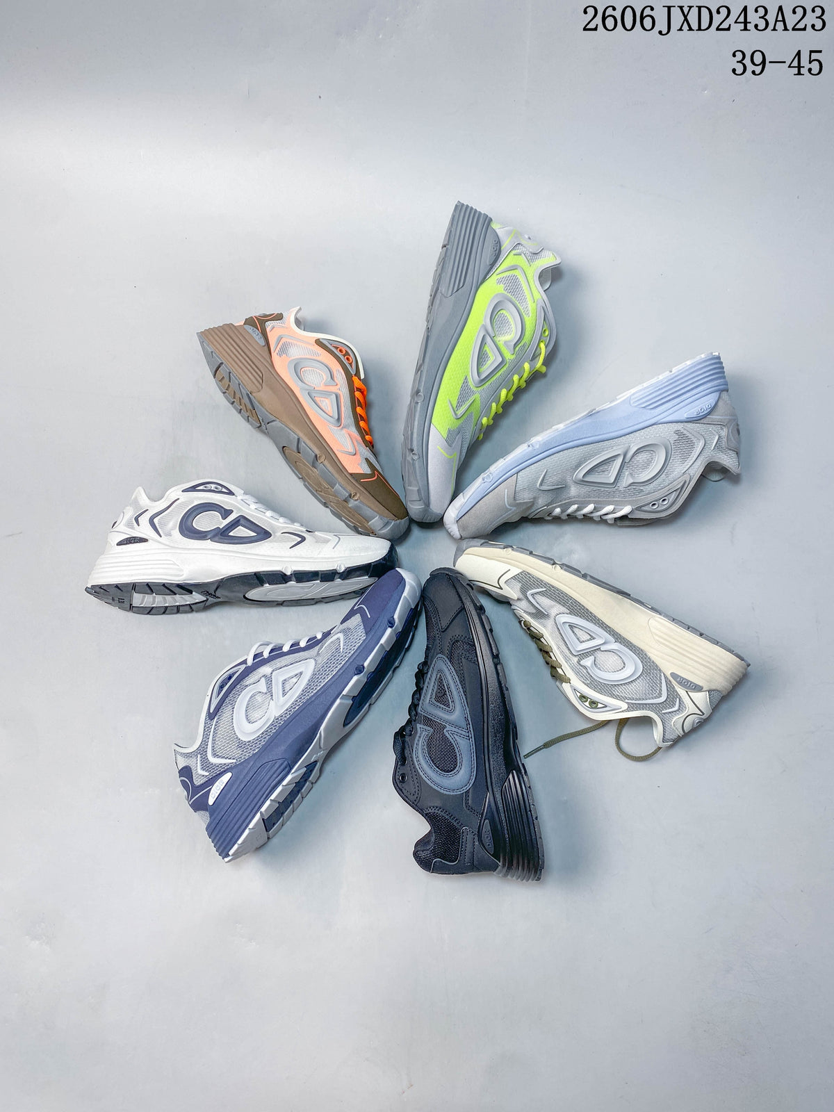 Several colorways of low-top sneakers arranged together, including white, gray, navy, charcoal, coral, and lime accents.