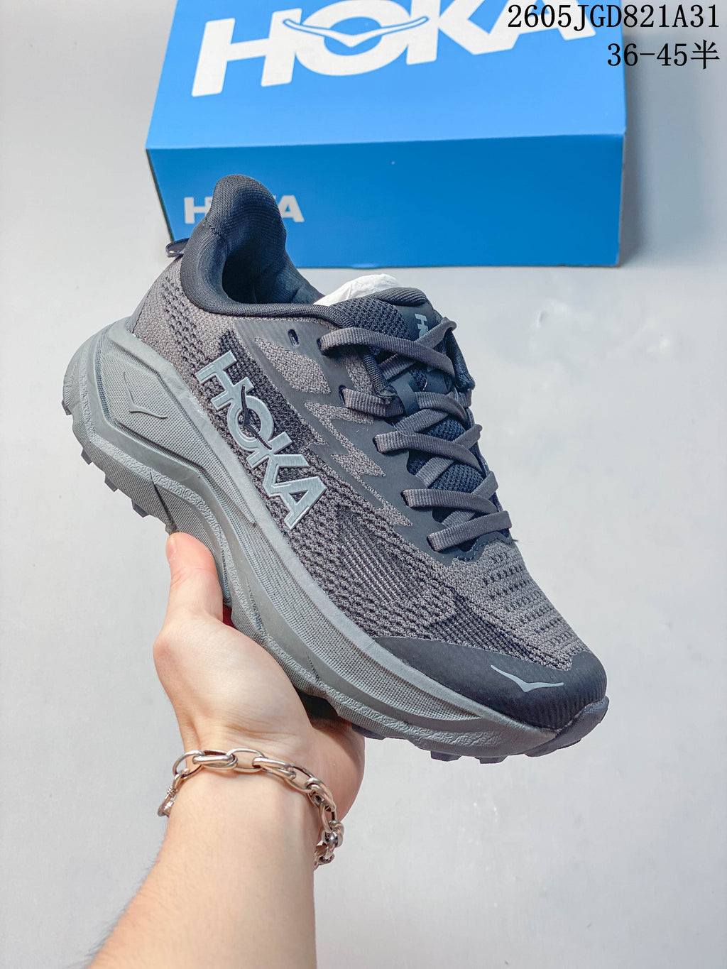 Gray HOKA Challenger 8 mesh running shoe with matching gray sole