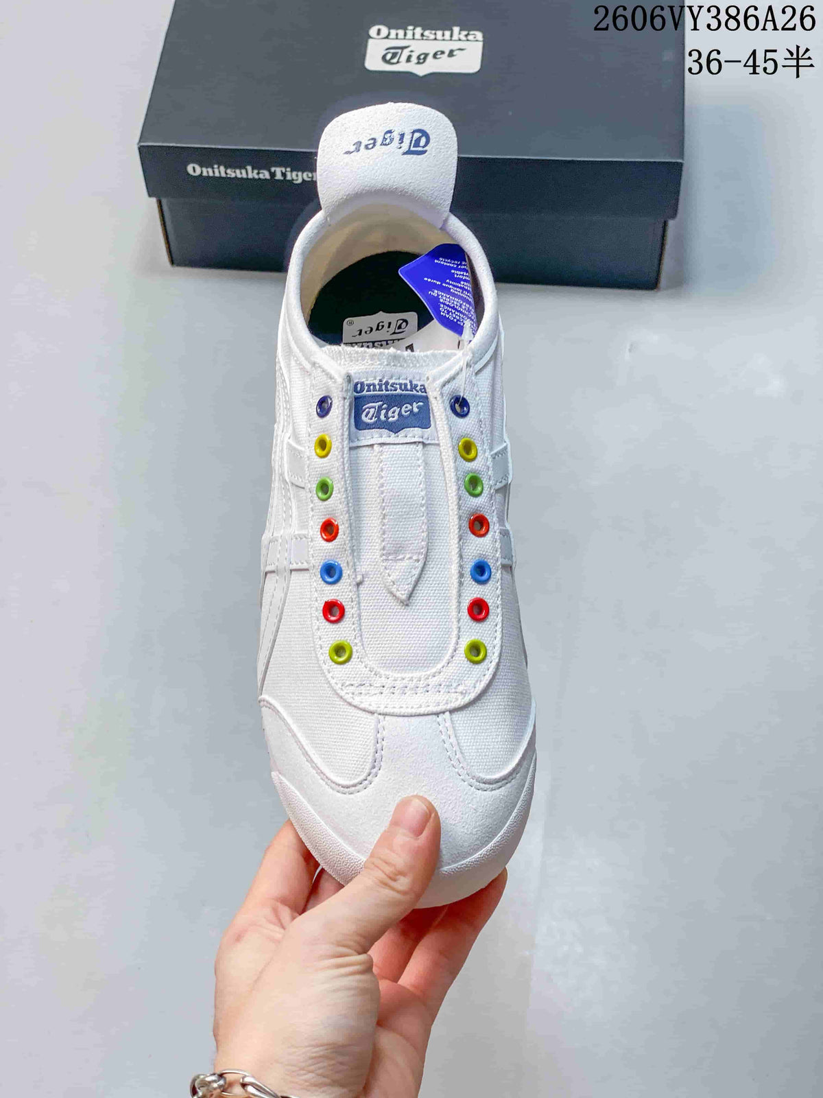 Top view of the white sneaker with multicolored eyelets along the vamp
