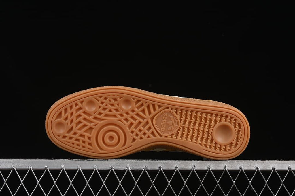 Underside view of the gum-colored outsole and tread pattern