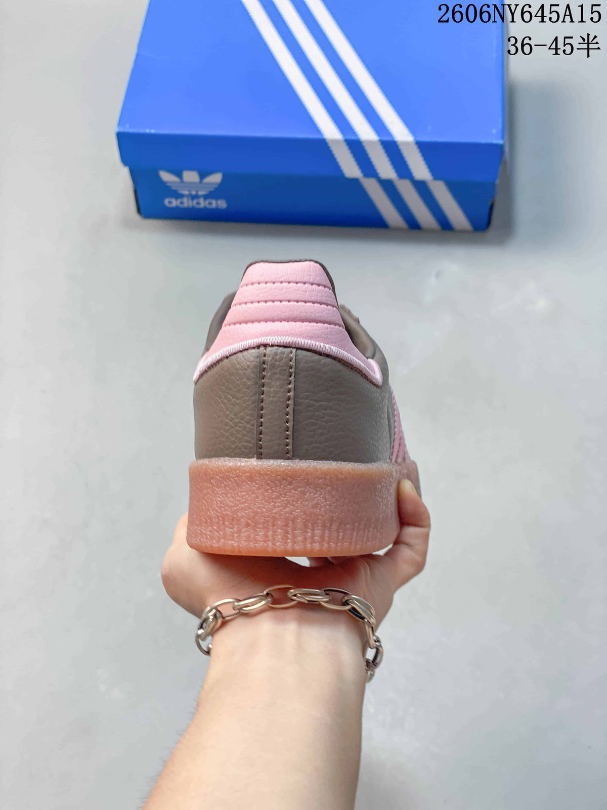 Rear view showing the pink heel accent and thick platform sole
