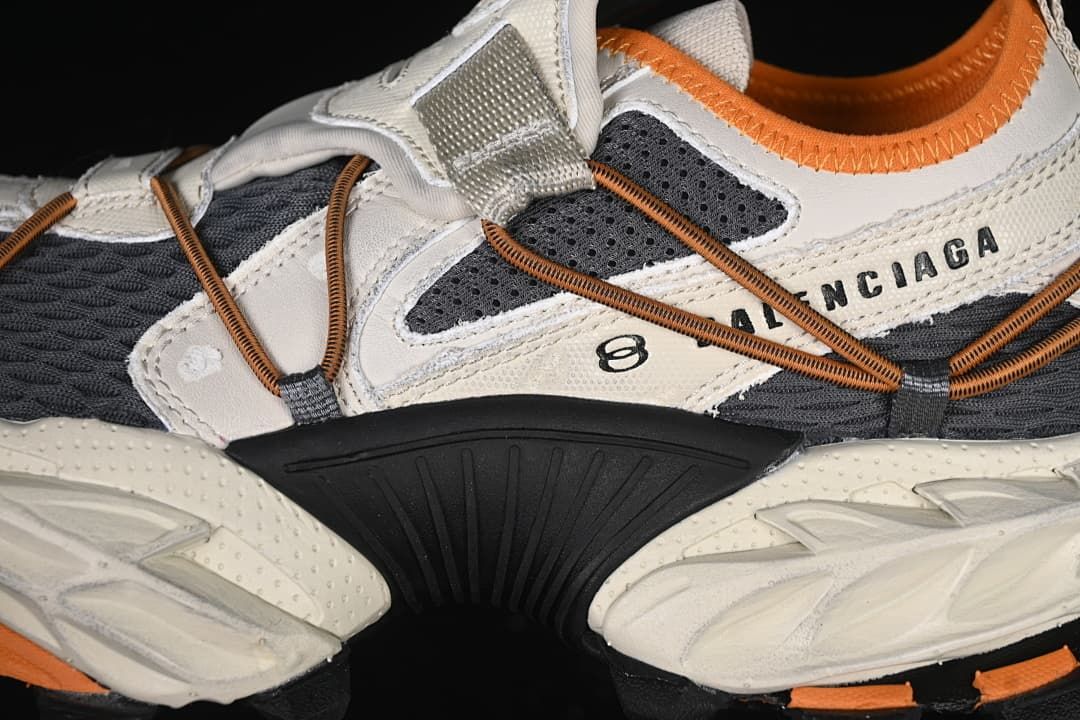 Side close-up of layered panels, elastic cords, and branding