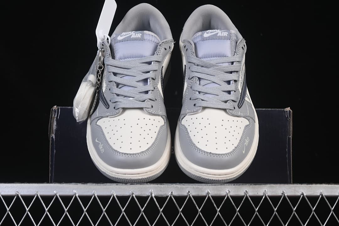 Front view of the pair showing perforated toe boxes, gray overlays, and laces.