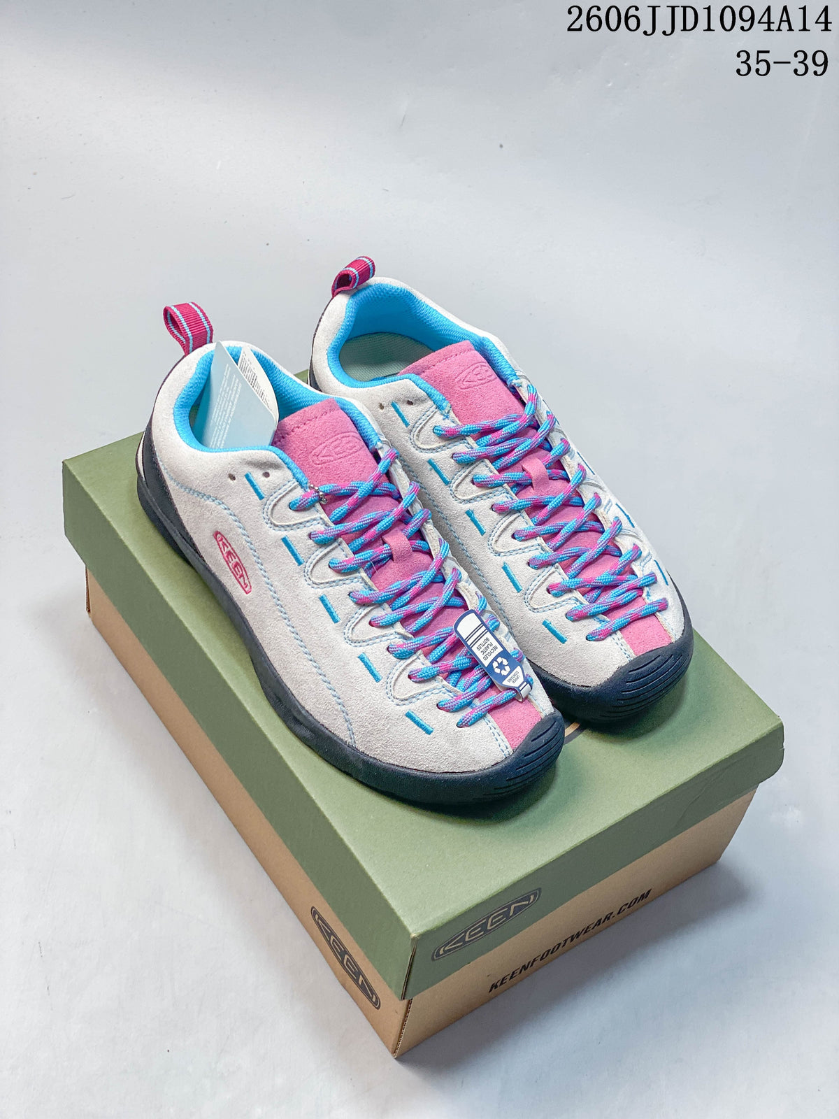 Pair of light gray KEEN Jasper low-top sneakers with pink and blue accents, shown on a shoe box