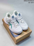 White ASICS Court FF 3 Novak tennis shoes with green accents shown on a shoe box