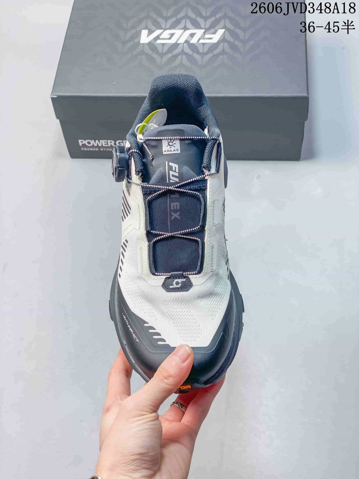 Front view showing the trail shoe's toe bumper, cord lacing, and dial closure.