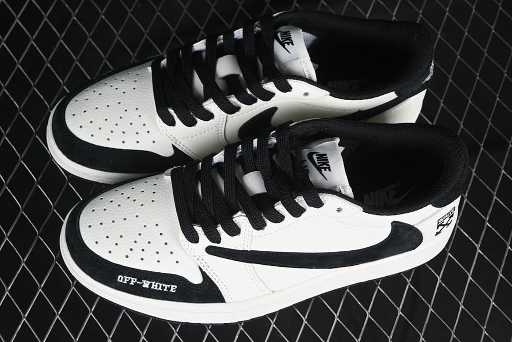 Pair of black-and-white low-top sneakers shown from above at an angle.