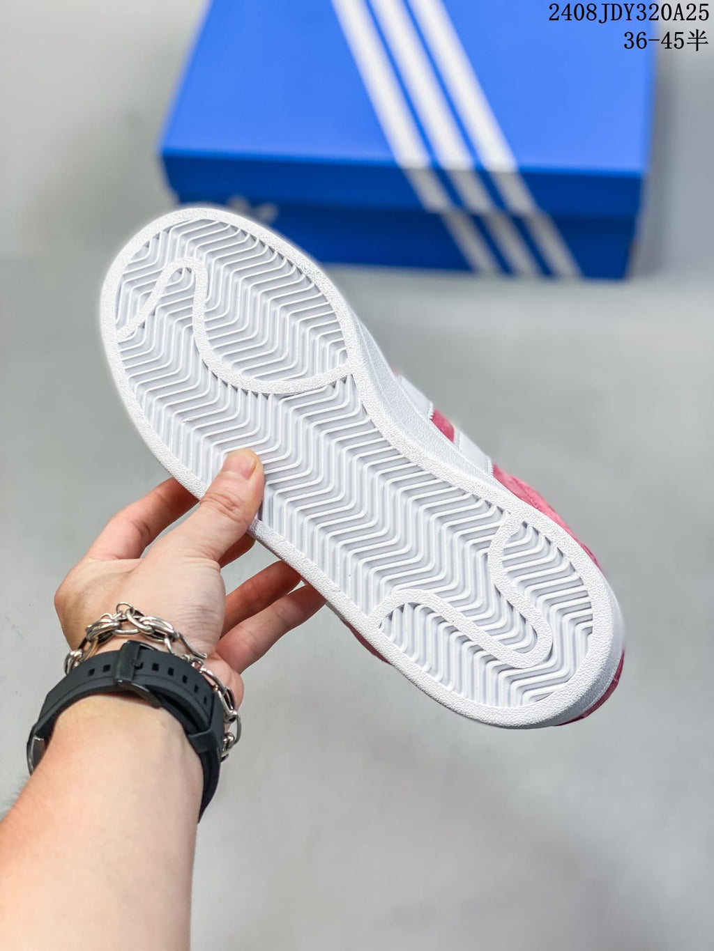 Underside of a sneaker showing a white patterned rubber outsole.