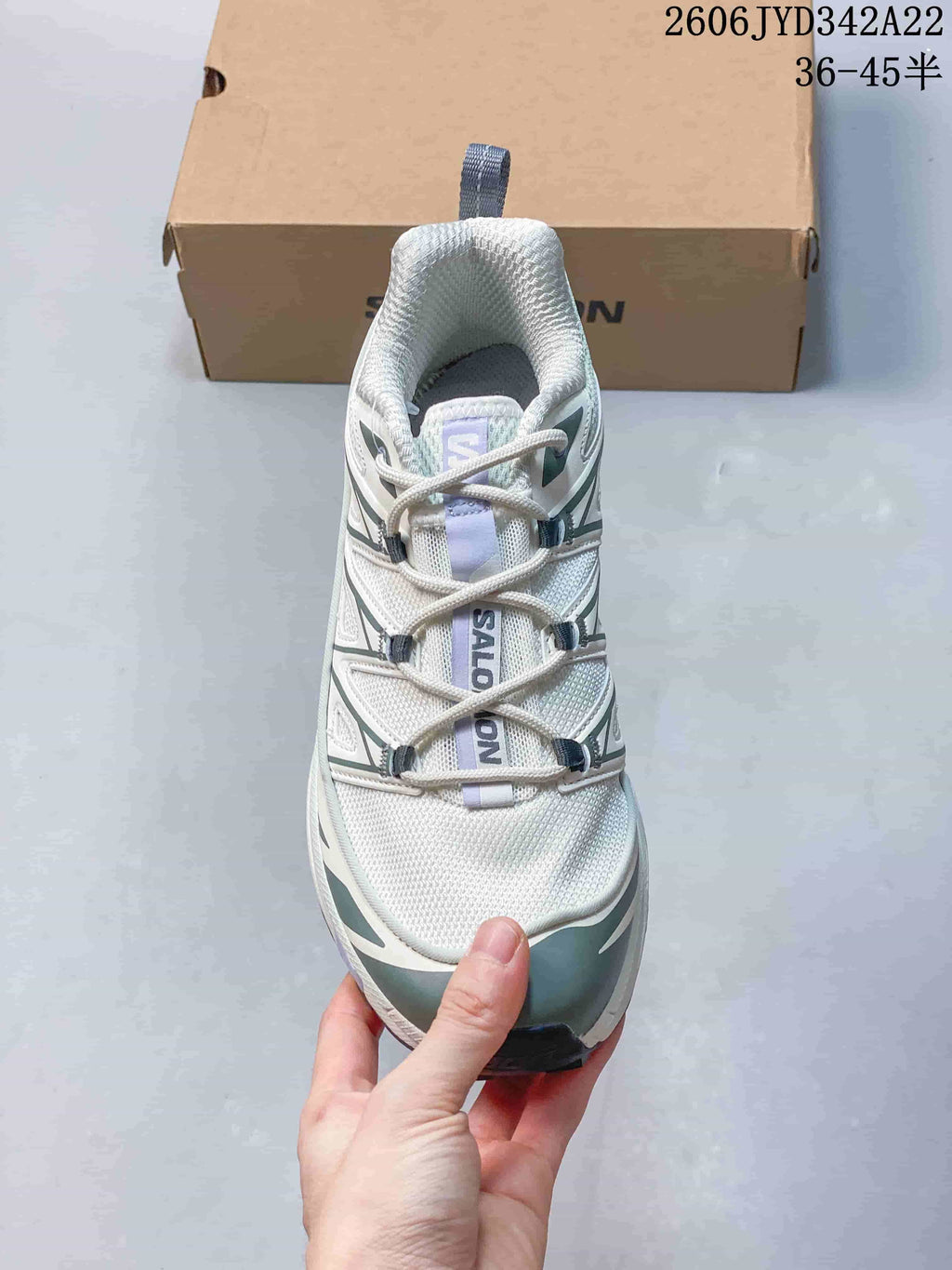 Top view of the sneaker showing its laces and mesh-look upper