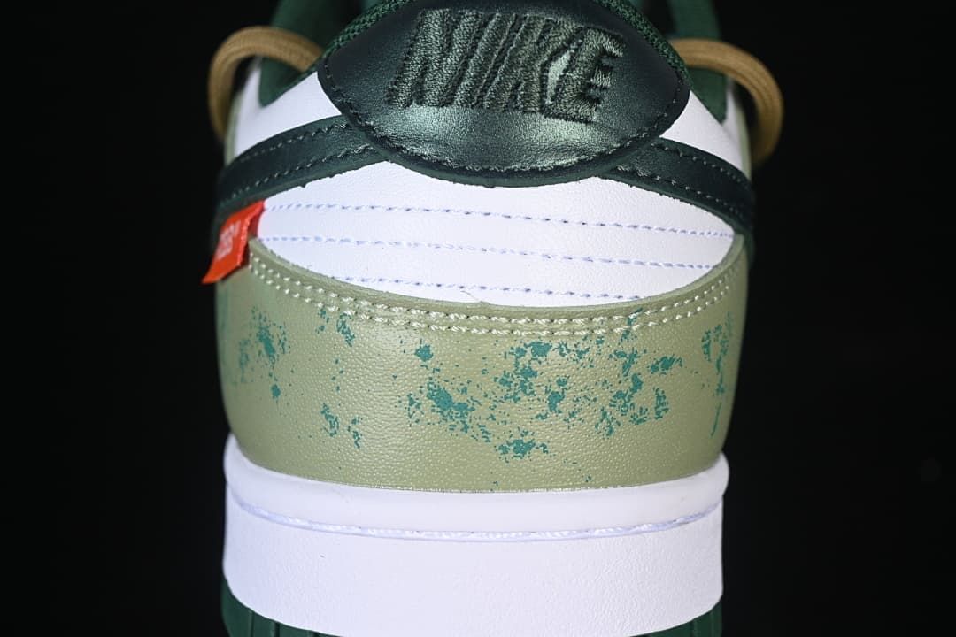 Close-up of the heel with patterned green overlay and dark green heel tab