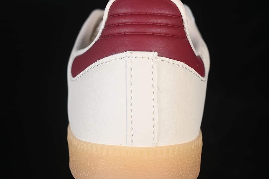 Rear view showing the cream heel and burgundy heel tab.