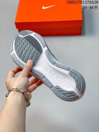 Underside view of a Nike Air Zoom Pegasus 42 shoe showing its patterned outsole.
