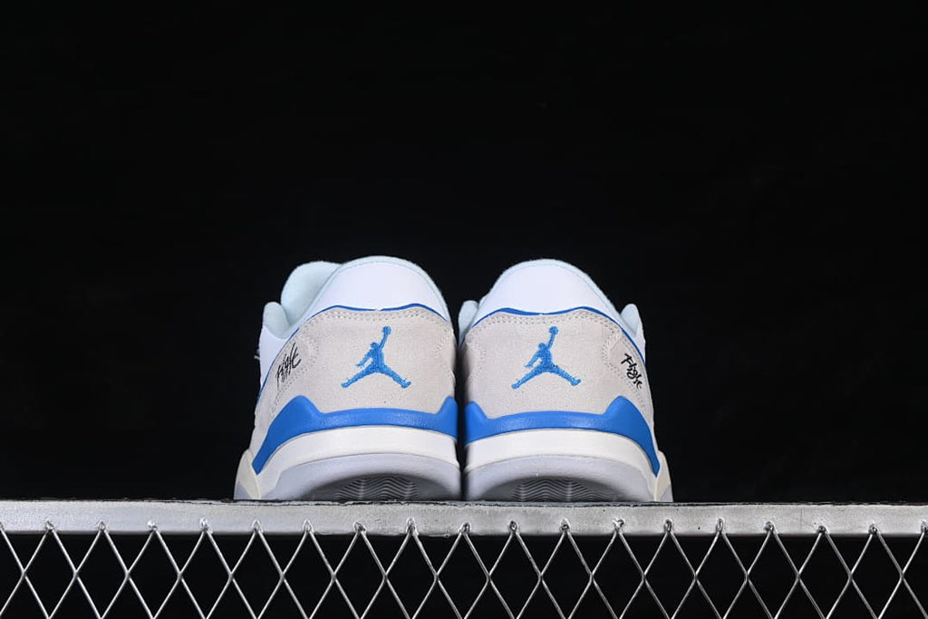 Rear view of both sneakers with blue heel accents