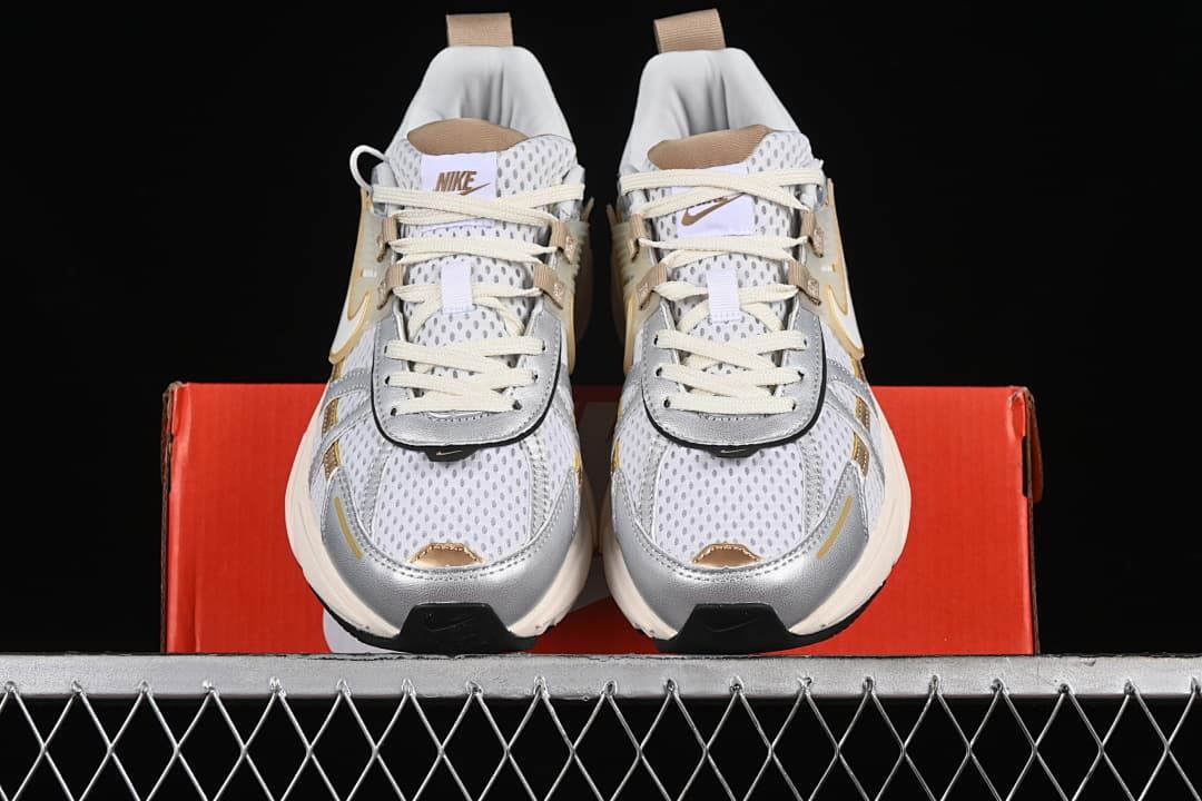 Front view of the pair showing the mesh toes, laces and metallic overlays.