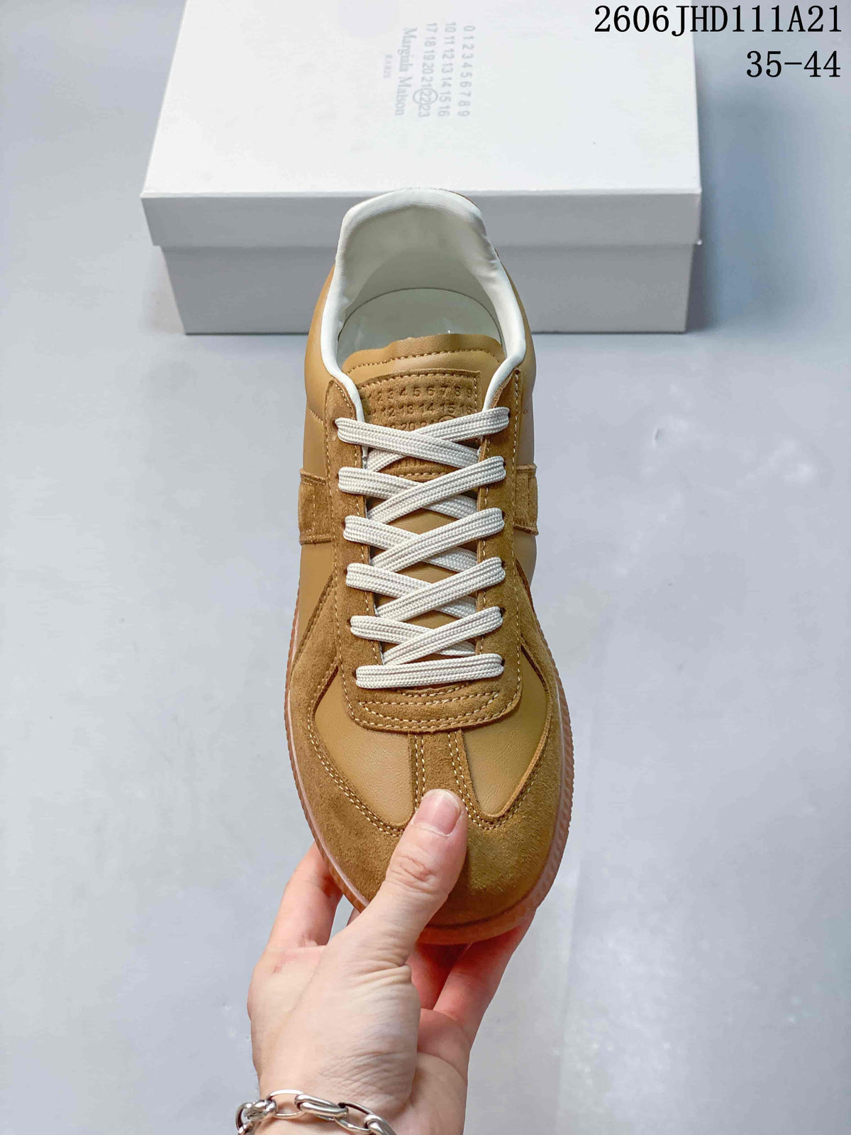 Top view showing cream laces and mixed tan panels