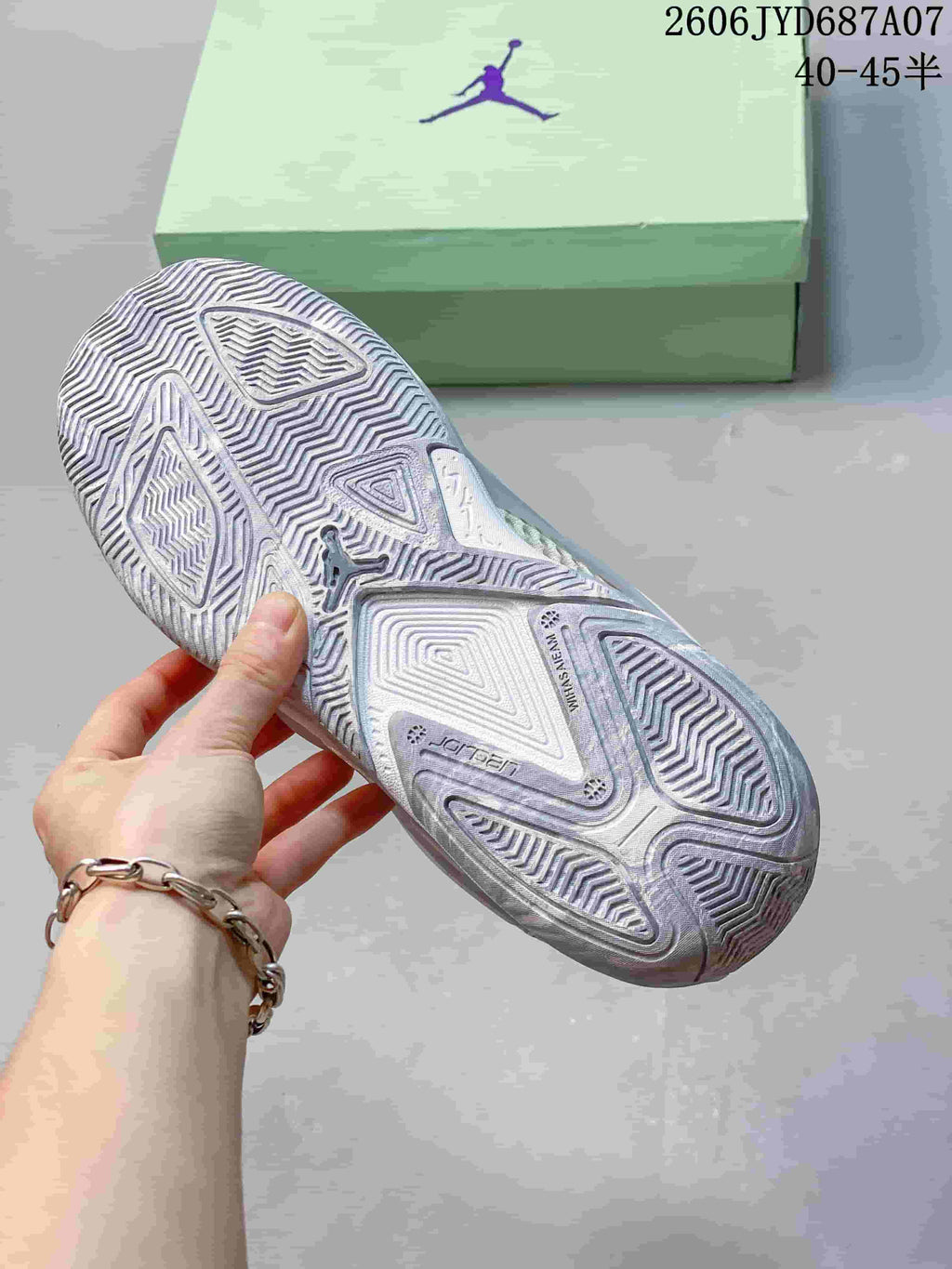 Close-up of the patterned outsole on a Jordan Heir PF shoe.