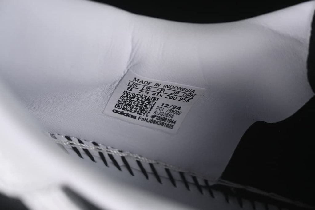 Interior shoe label showing size conversions and model code JQ3666