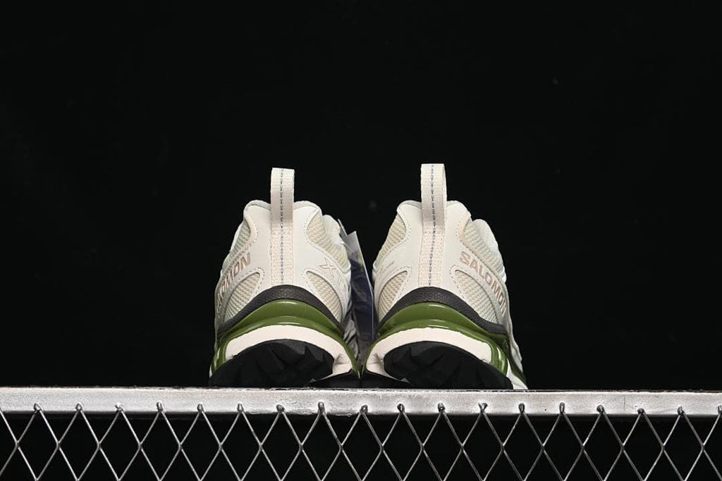 Rear view of the pair showing heel details and outsole edges.
