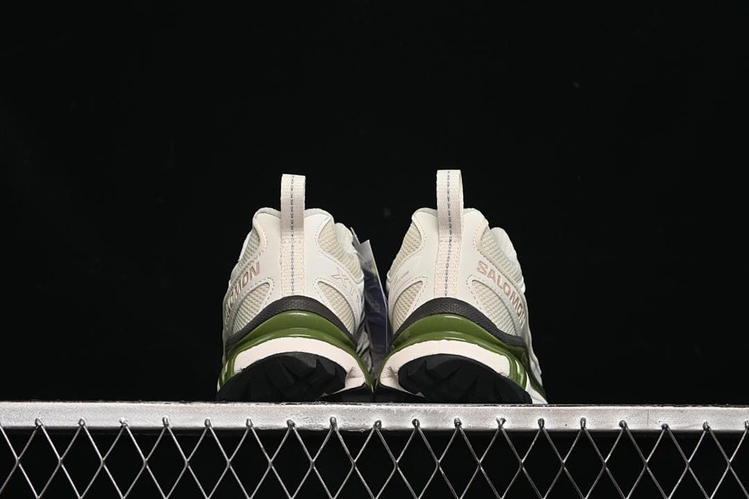 Rear view of the pair showing heel details and outsole edges.