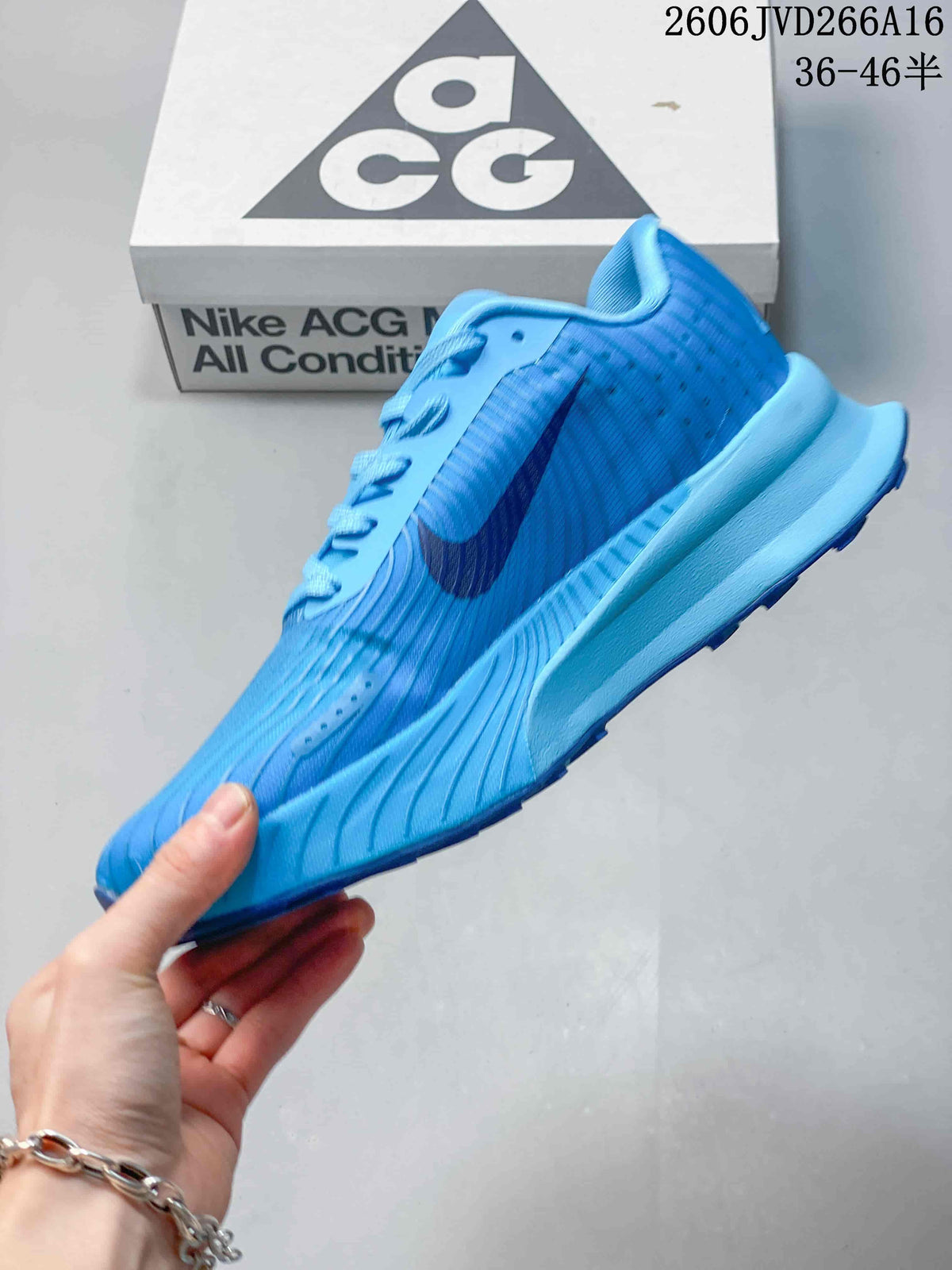 Side view of the blue Nike ACG trail shoe