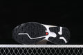 Underside of the Salomon XT-6 Expanse sneaker showing a black lugged outsole.