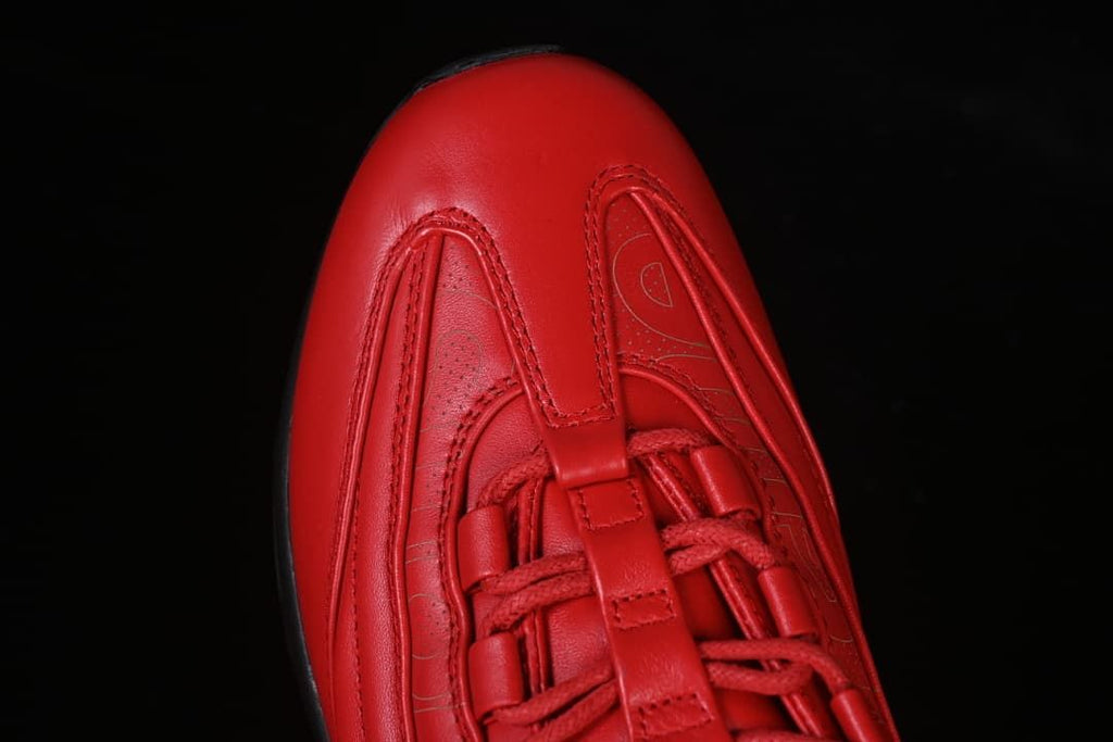 Top view of the red sneaker toe and lace arrangement