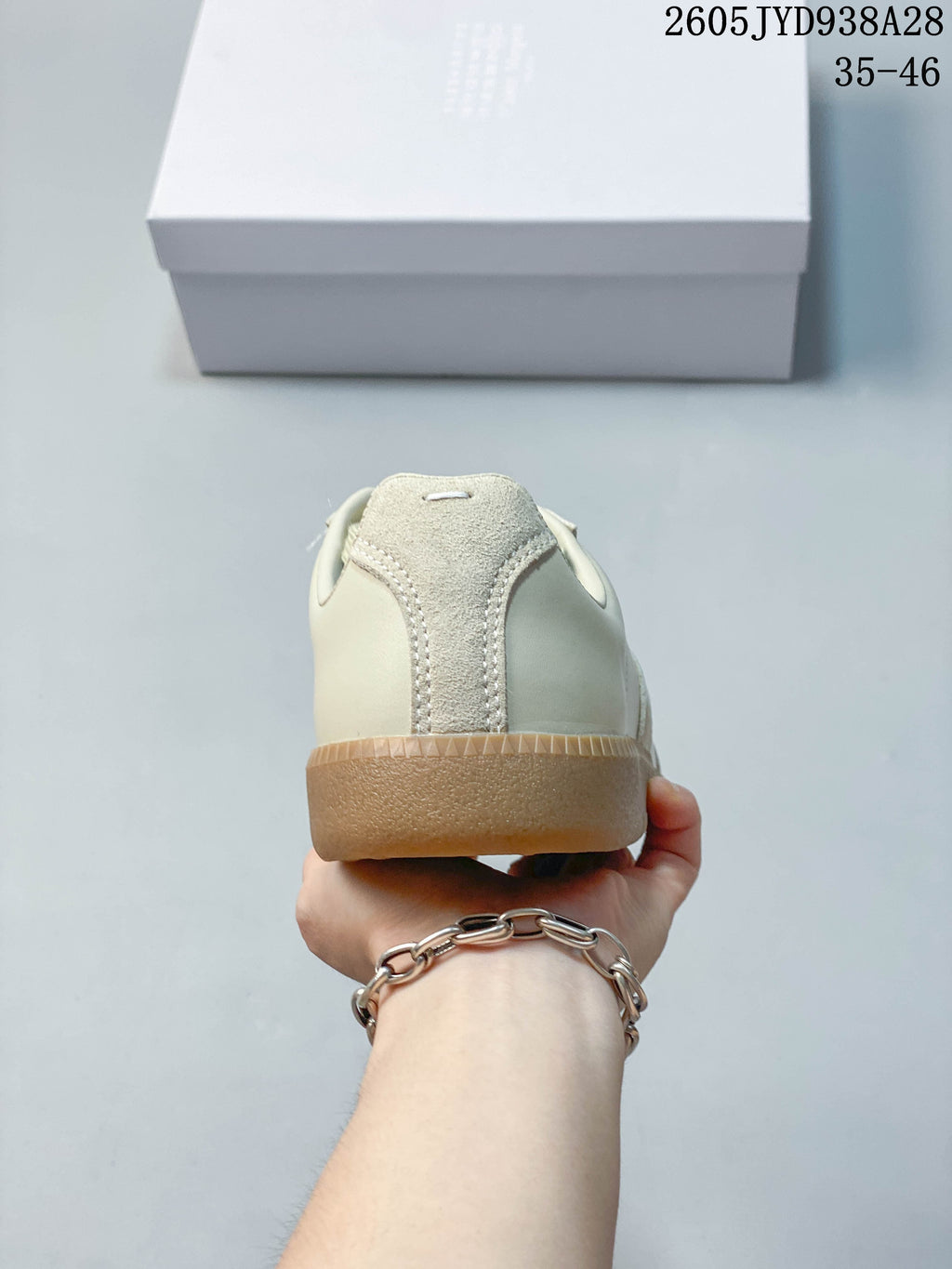 Rear view showing the heel and gum-colored sole