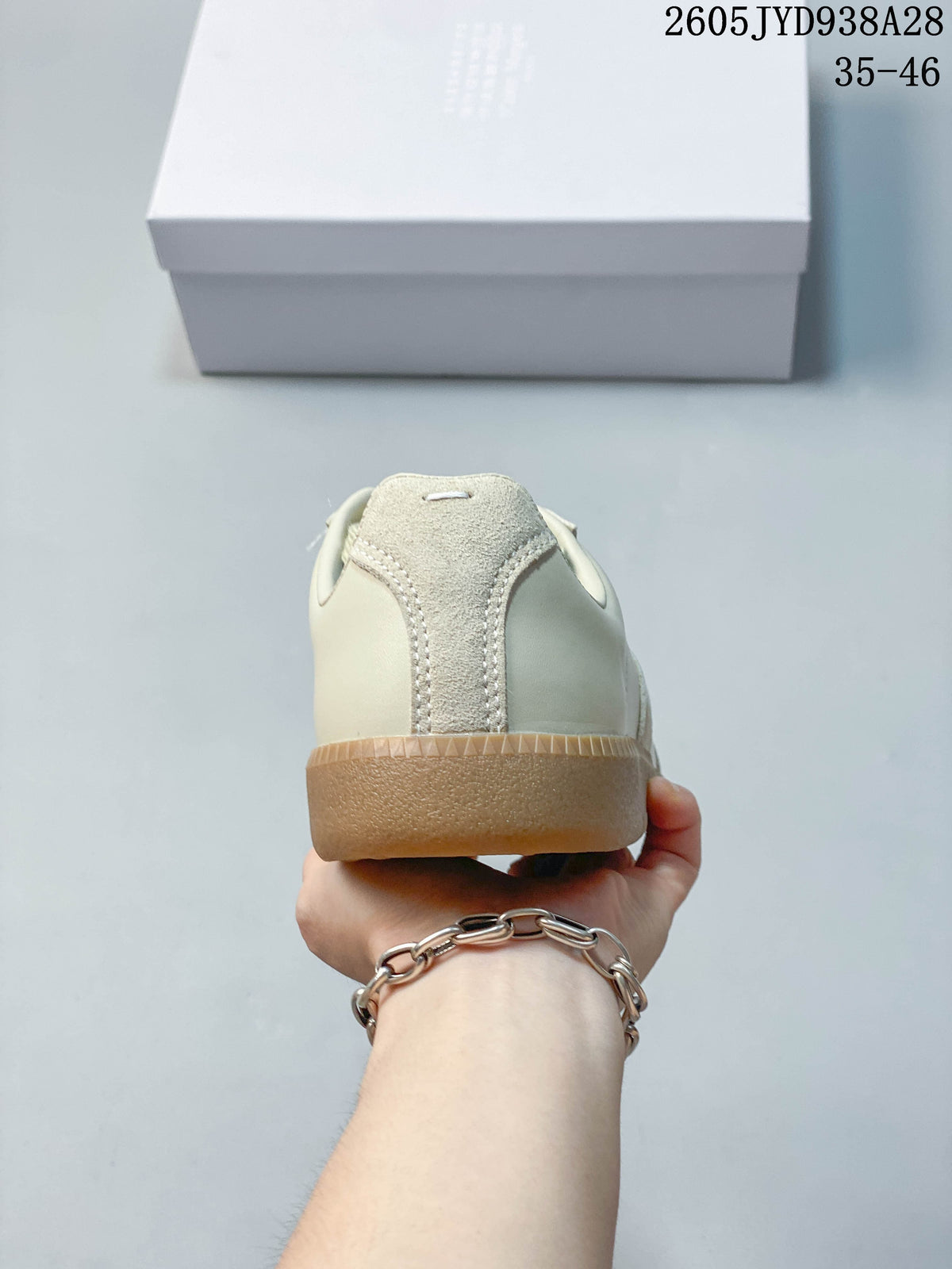 Rear view showing the heel and gum-colored sole