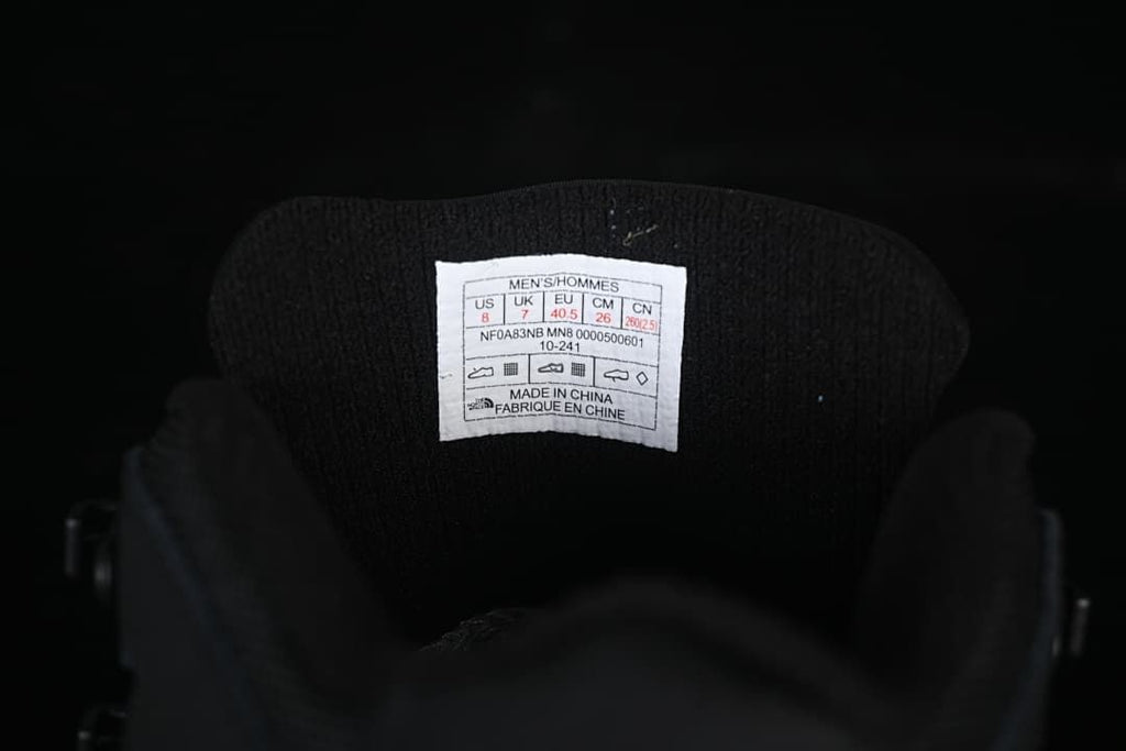 Boot tongue size label showing men's US 8, UK 7, EU 40.5 and CM 26