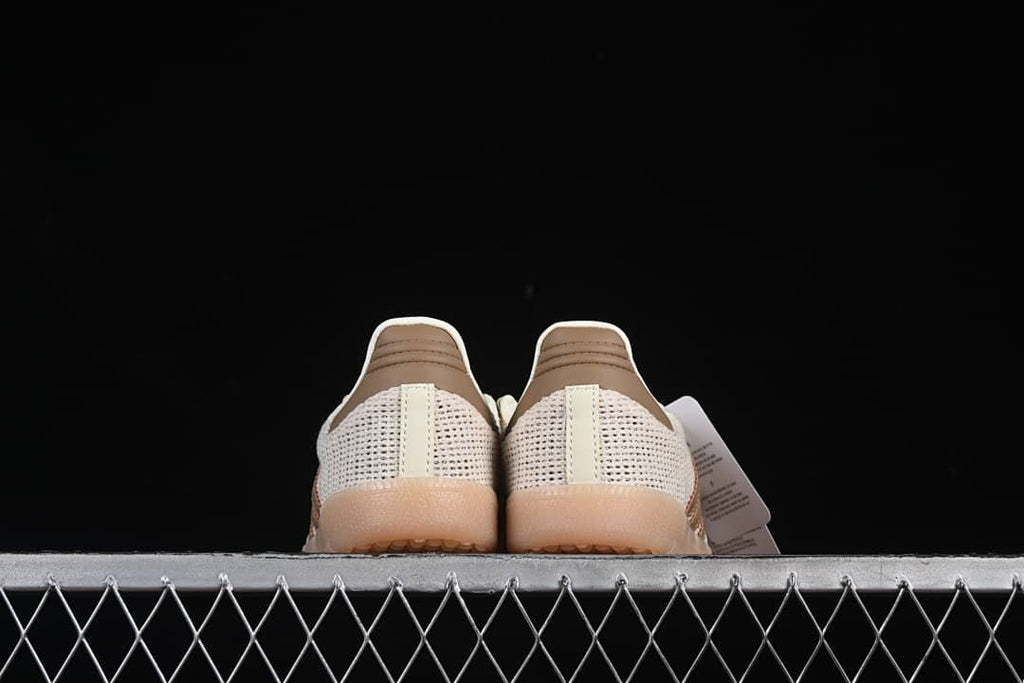 Rear view of both sneakers showing the heel panels