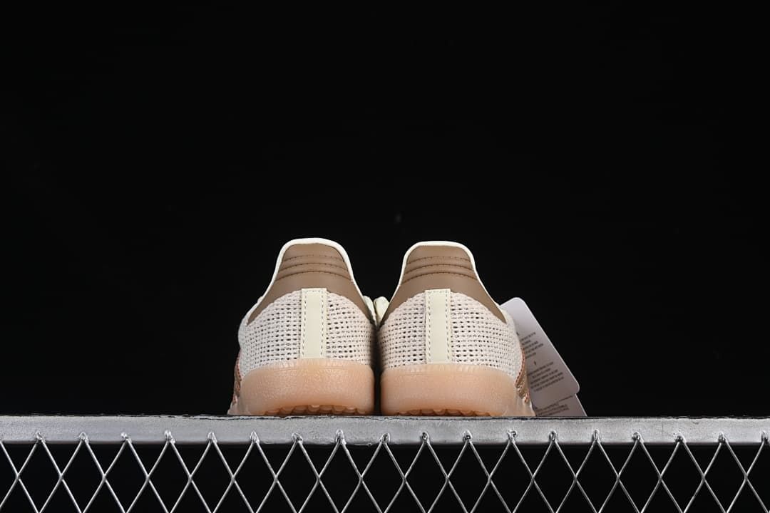 Rear view of both sneakers showing the heel panels